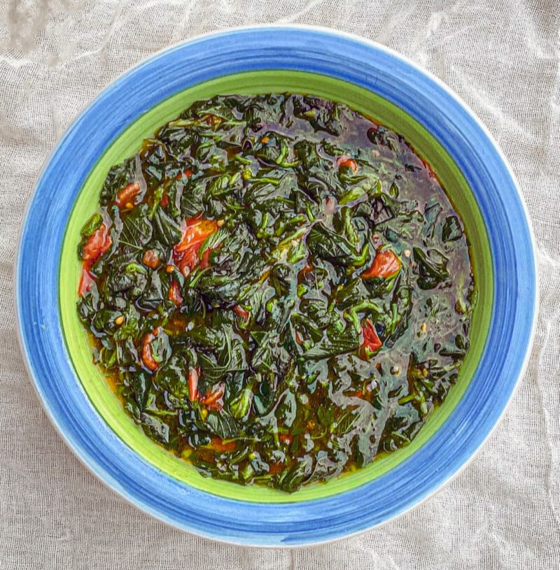 South African Delele dish made from okra cooked with tomato and onion, served with pap.